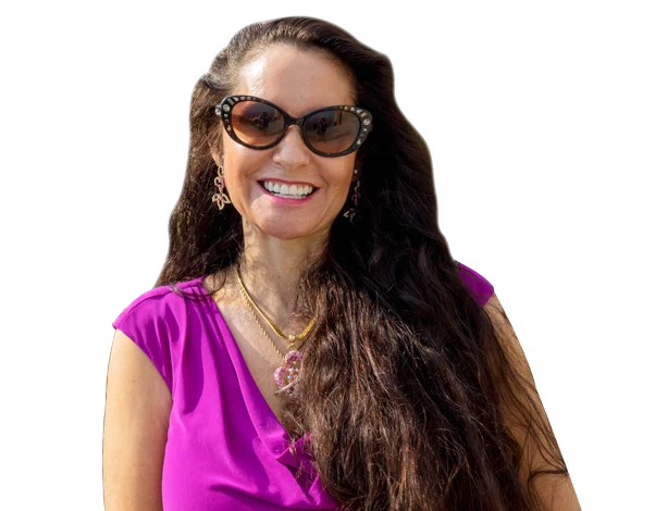 A woman smiling in the desert sun